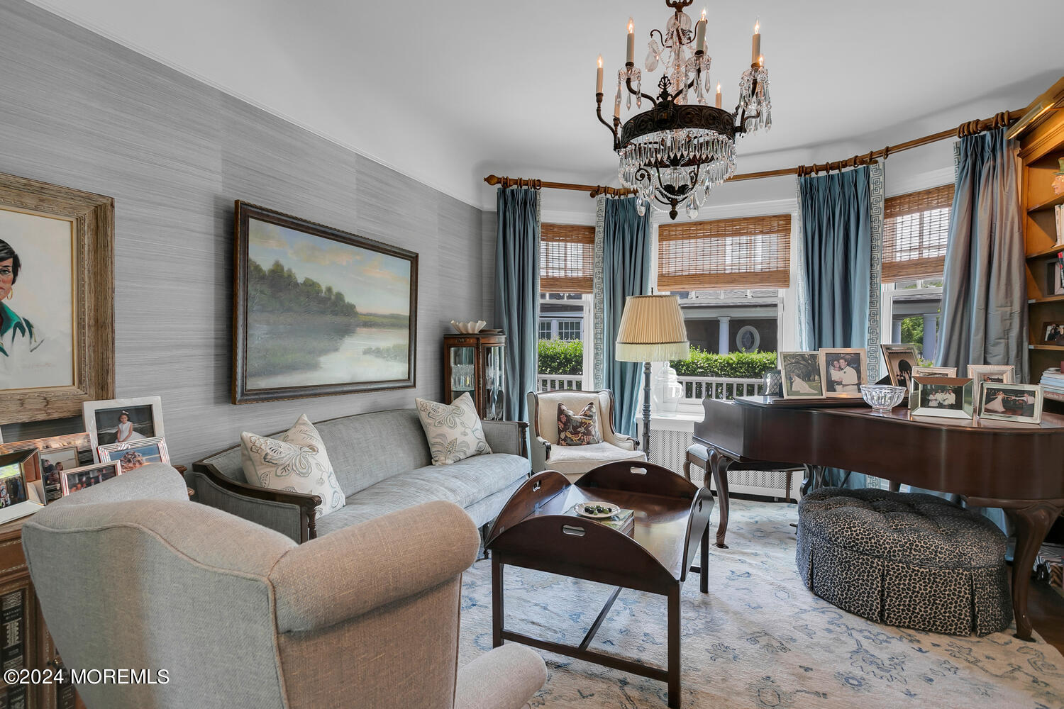 109 Washington Avenue Spring Lake, NJ 07762 - Photo 20 of 72 a living room with fireplace furniture and a chandelier