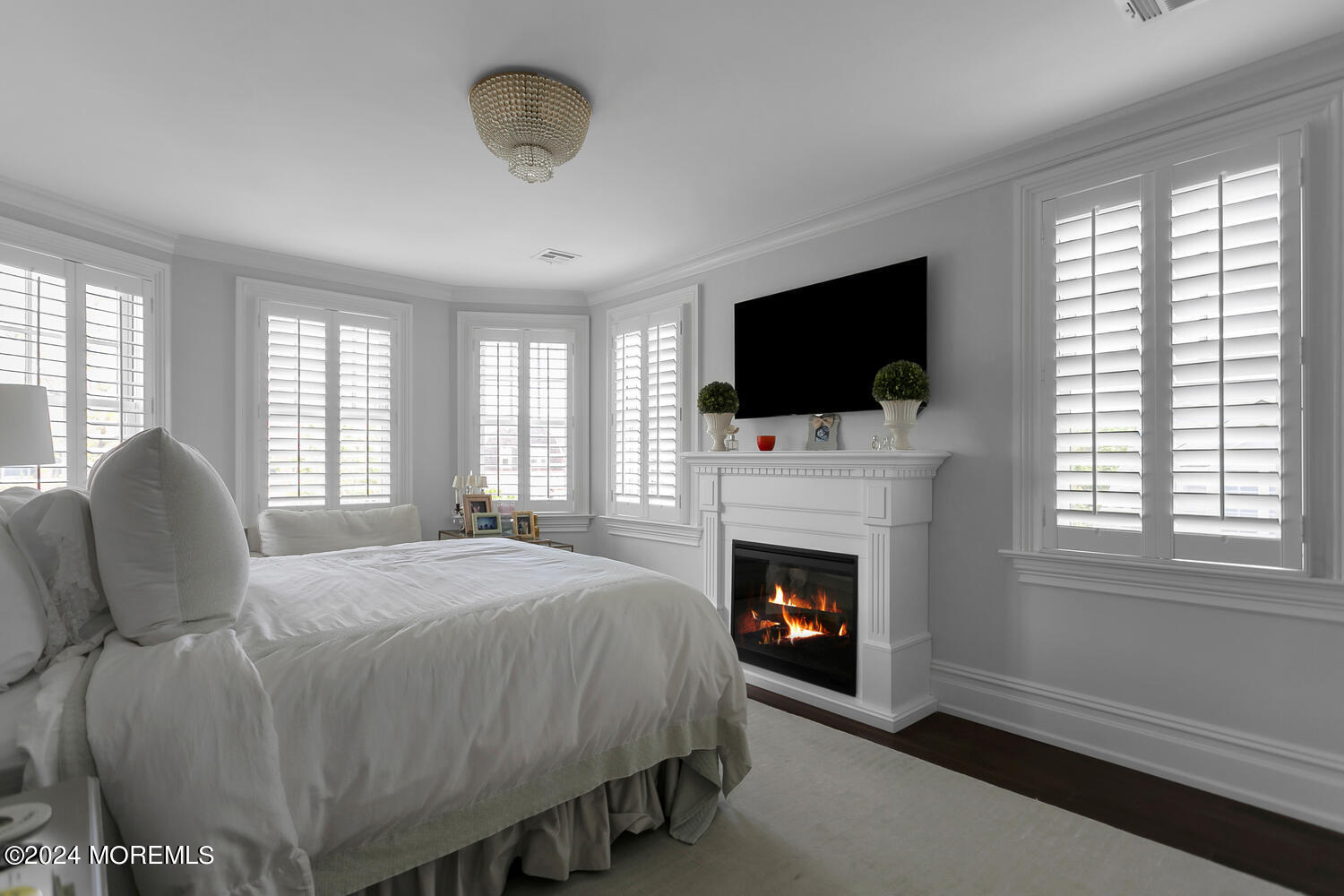 109 Washington Avenue Spring Lake, NJ 07762 - Photo 30 of 72 a bedroom with a bed and a flat screen tv