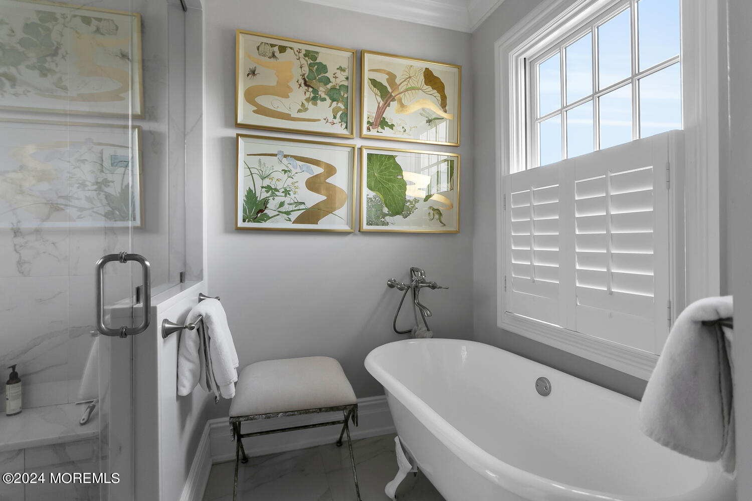 109 Washington Avenue Spring Lake, NJ 07762 - Photo 36 of 72 a bathroom with a tub sink and window