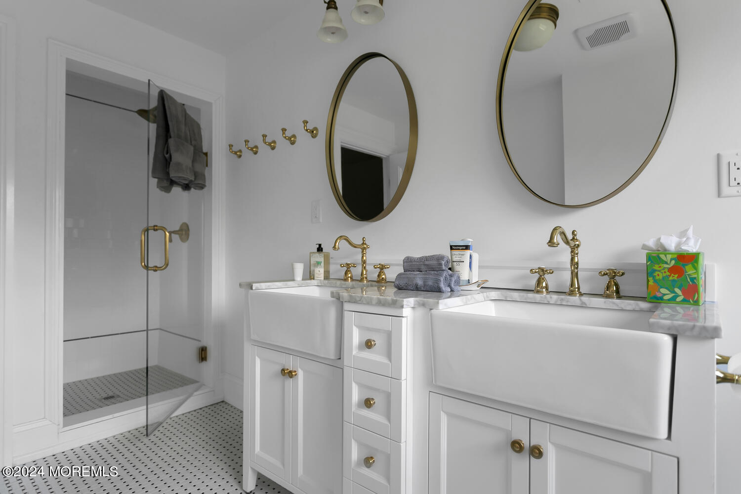 109 Washington Avenue Spring Lake, NJ 07762 - Photo 54 of 72 a bathroom with a sink and a mirror