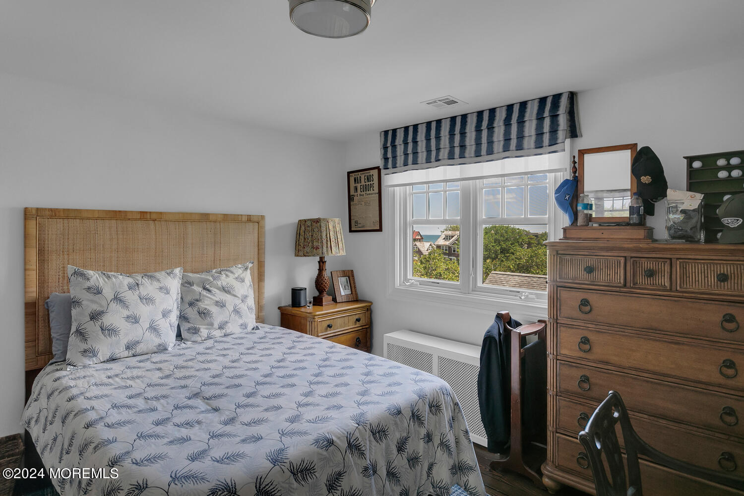 109 Washington Avenue Spring Lake, NJ 07762 - Photo 57 of 72 a bedroom with a bed a window and dresser