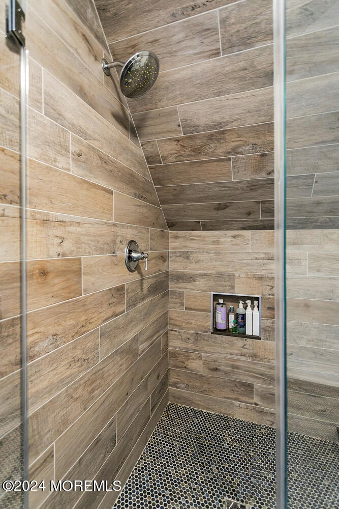 109 Washington Avenue Spring Lake, NJ 07762 - Photo 60 of 72 a bathroom with a shower