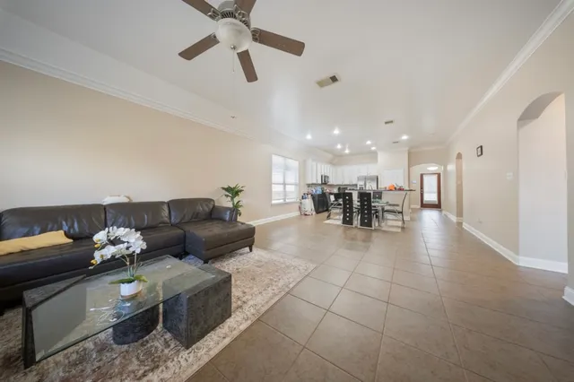 a bathroom with a tub a sink and a shower