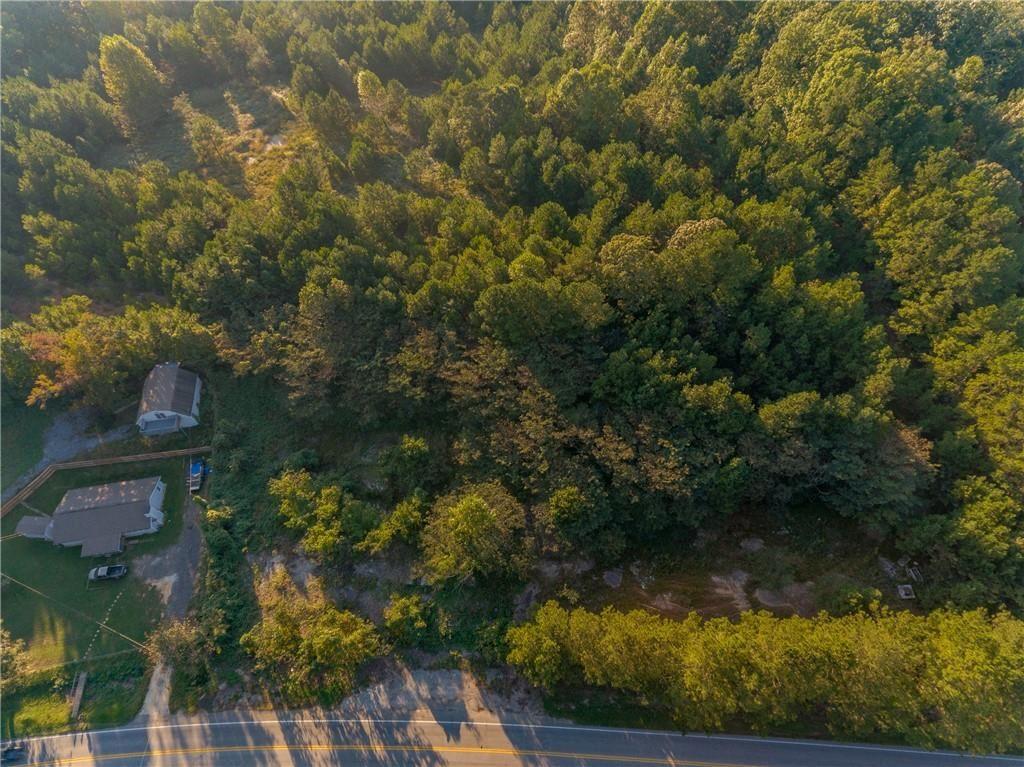 1428 Bobo Road Dallas, GA 30132 - Photo 12 of 12 an aerial view of residential houses with outdoor space and trees
