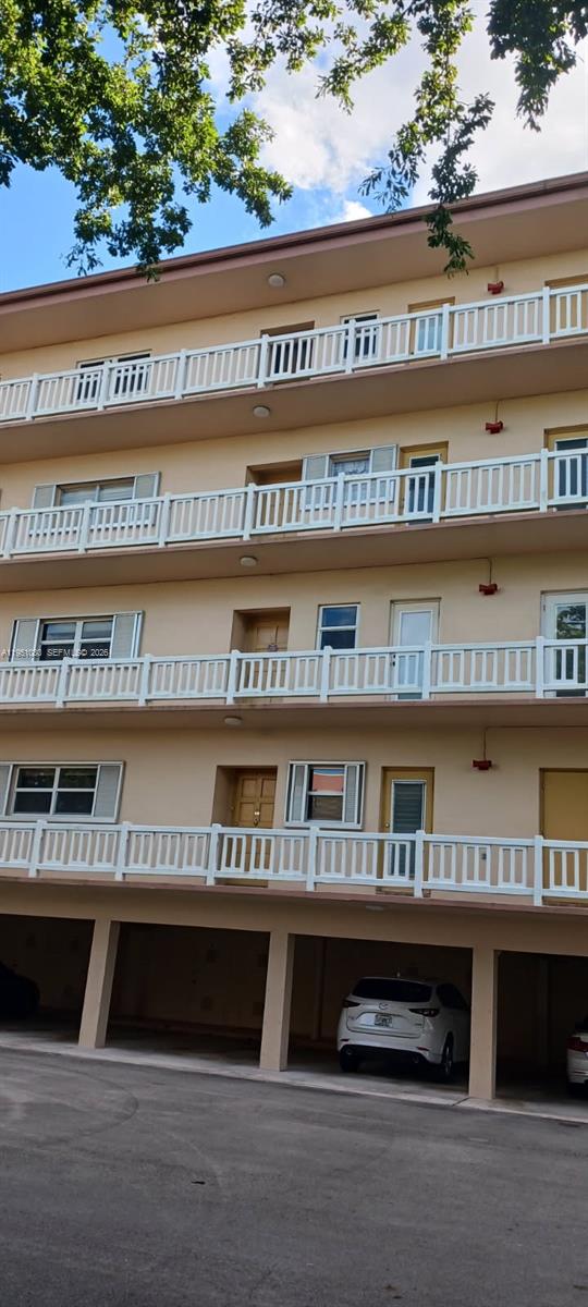 6731 Cypress Road, Unit 310 Plantation, FL 33317 - Photo 10 of 16 a view of cabinet and window