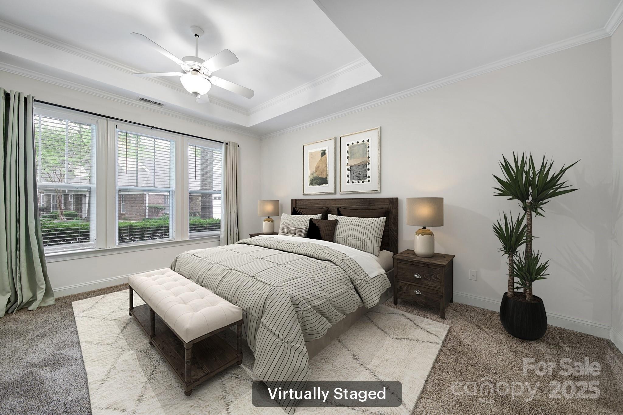 2959 Bellasera Way Matthews, NC 28105 - Photo 14 of 30 a spacious bedroom with a large bed and a chandelier