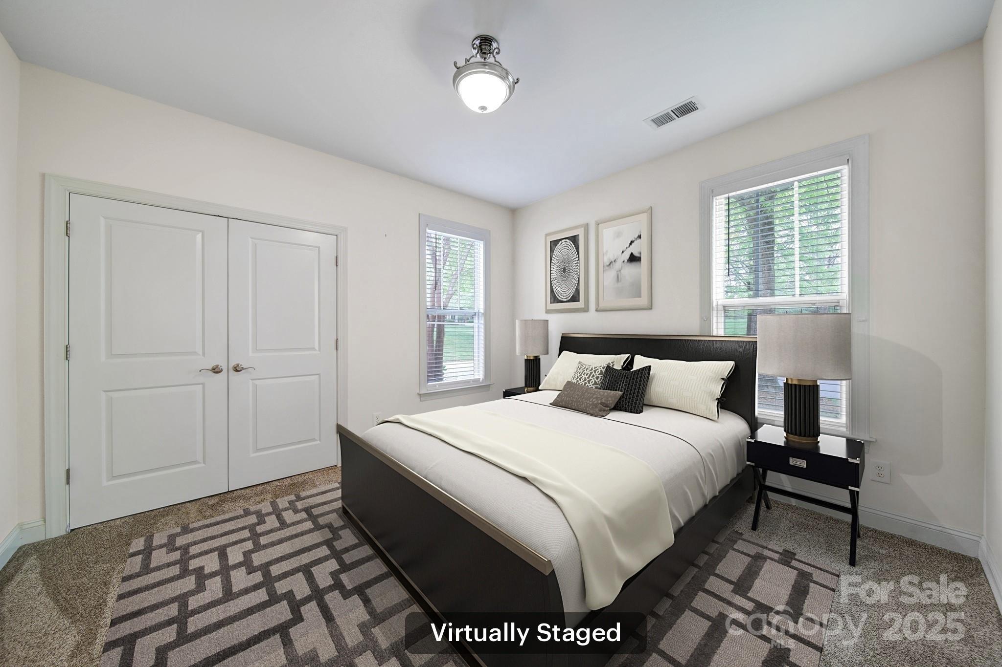 2959 Bellasera Way Matthews, NC 28105 - Photo 19 of 30 a bedroom with a bed and a window