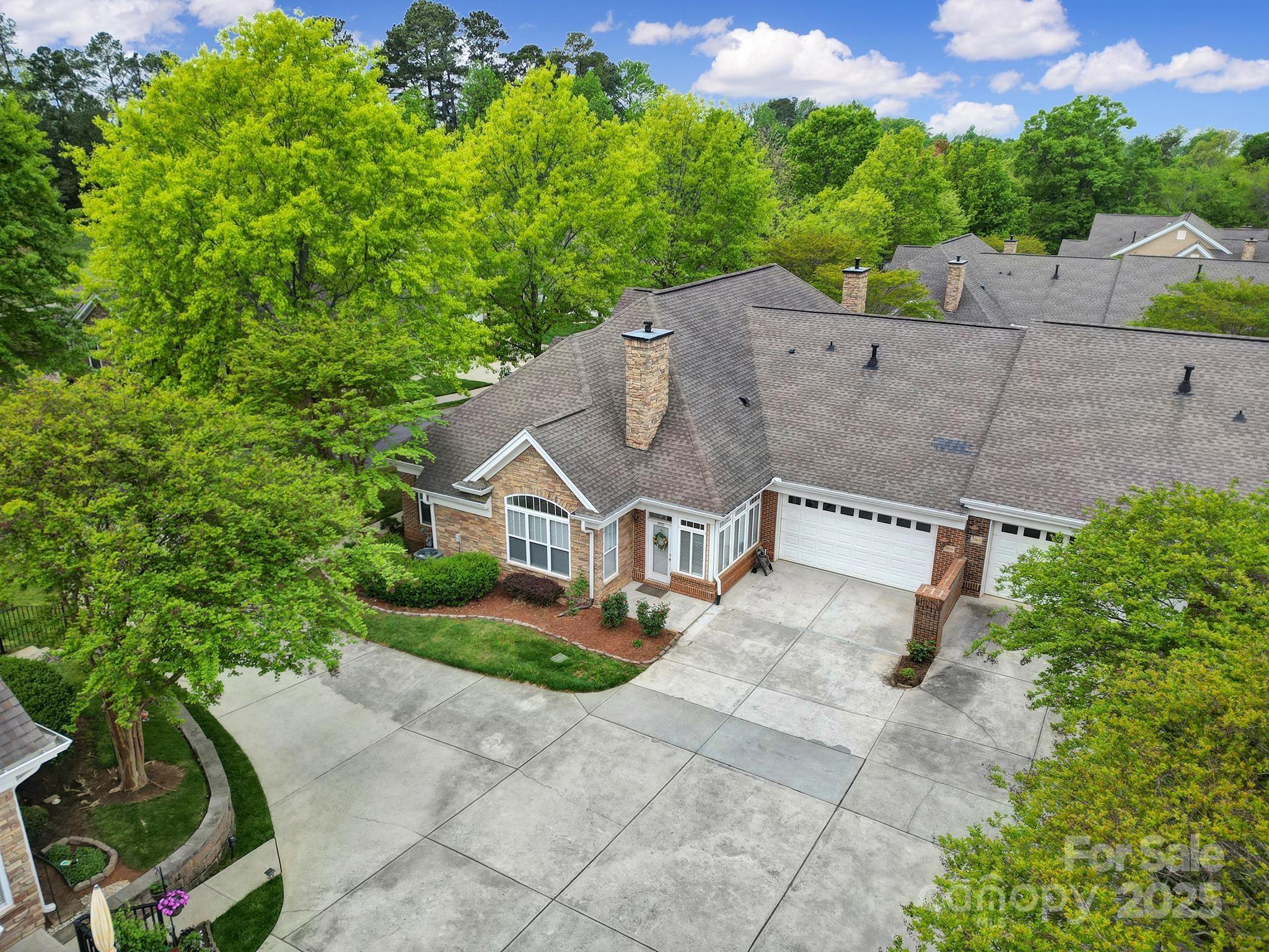 2959 Bellasera Way Matthews, NC 28105 - Photo 25 of 30 an aerial view of a house