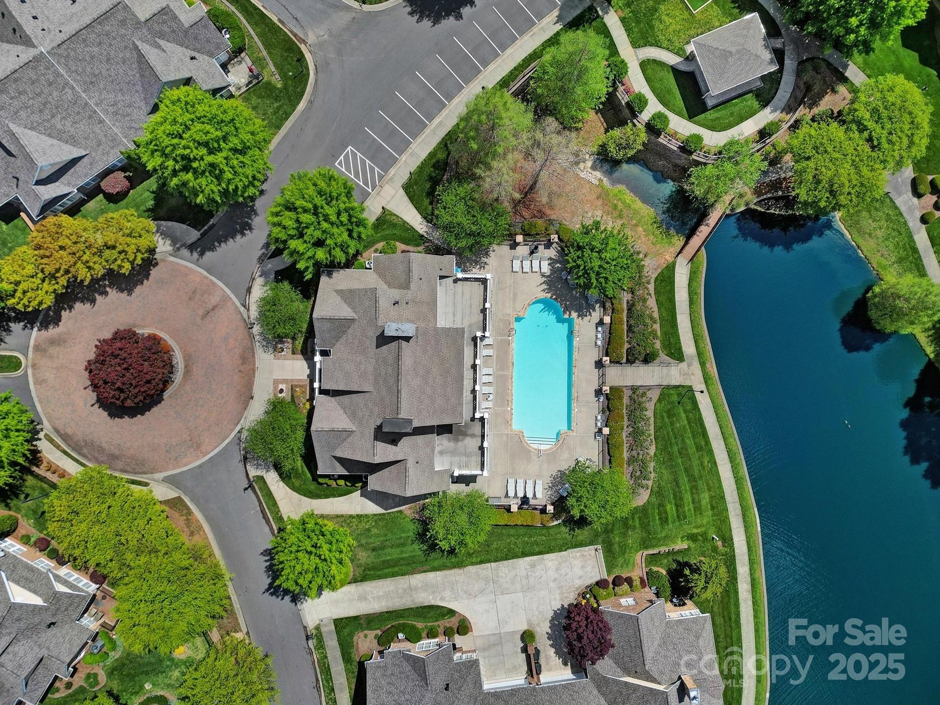 2959 Bellasera Way Matthews, NC 28105 - Photo 30 of 30 an aerial view of a house with garden space and street view