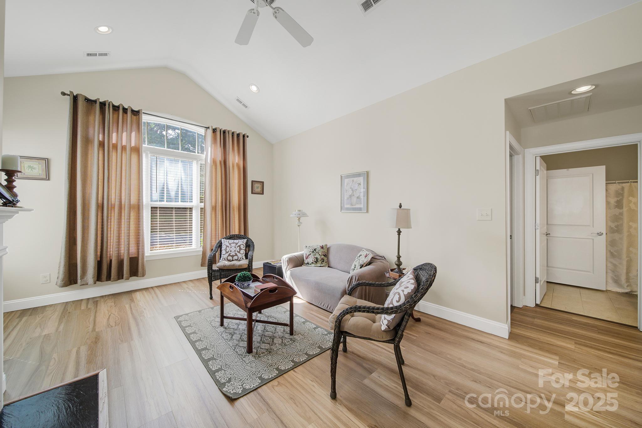 2959 Bellasera Way Matthews, NC 28105 - Photo 6 of 30 a dining room with furniture and wooden floor