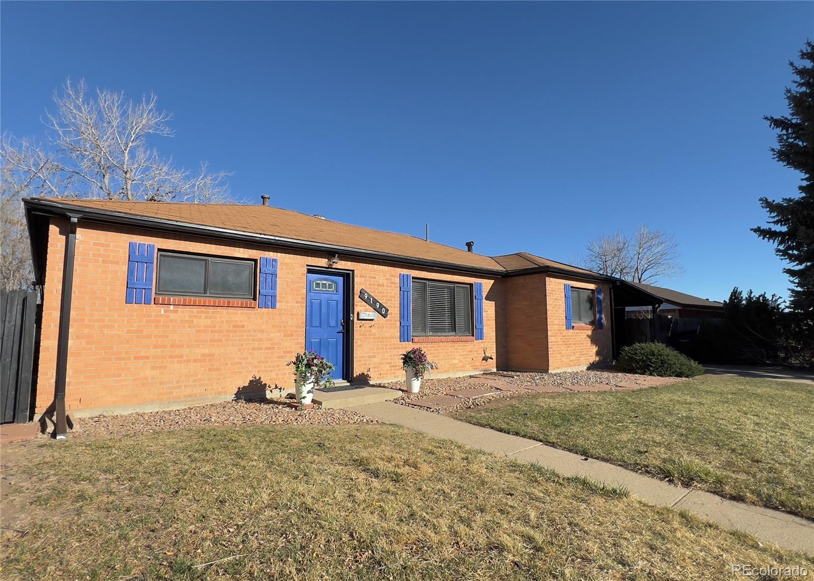 9190 High Street Thornton, CO 80229 - Photo 1 of 28 a front view of house with yard
