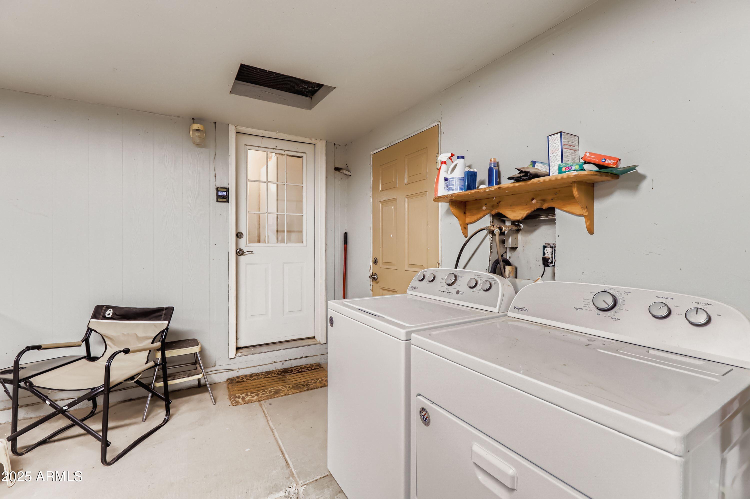 20607 West Chandler Heights Road Buckeye, AZ 85326 - Photo 27 of 29 a room with storage and utility