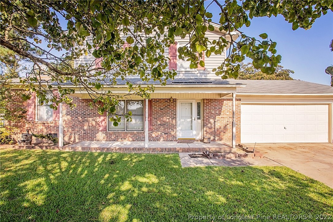 138 Pecan Trace Road Raeford, NC 28376 - Photo 1 of 42 front view of a house with a yard
