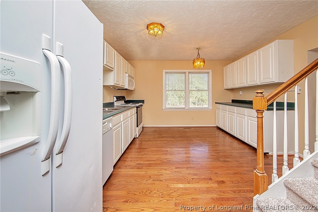 138 Pecan Trace Road Raeford, NC 28376 - Photo 15 of 42 a hallway with windows