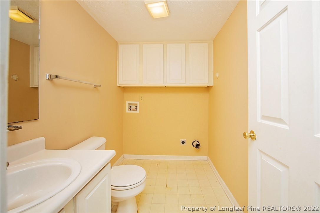 138 Pecan Trace Road Raeford, NC 28376 - Photo 20 of 42 a bathroom with a sink and toilet