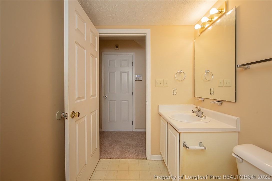 138 Pecan Trace Road Raeford, NC 28376 - Photo 21 of 42 a bathroom with a sink a toilet and shower
