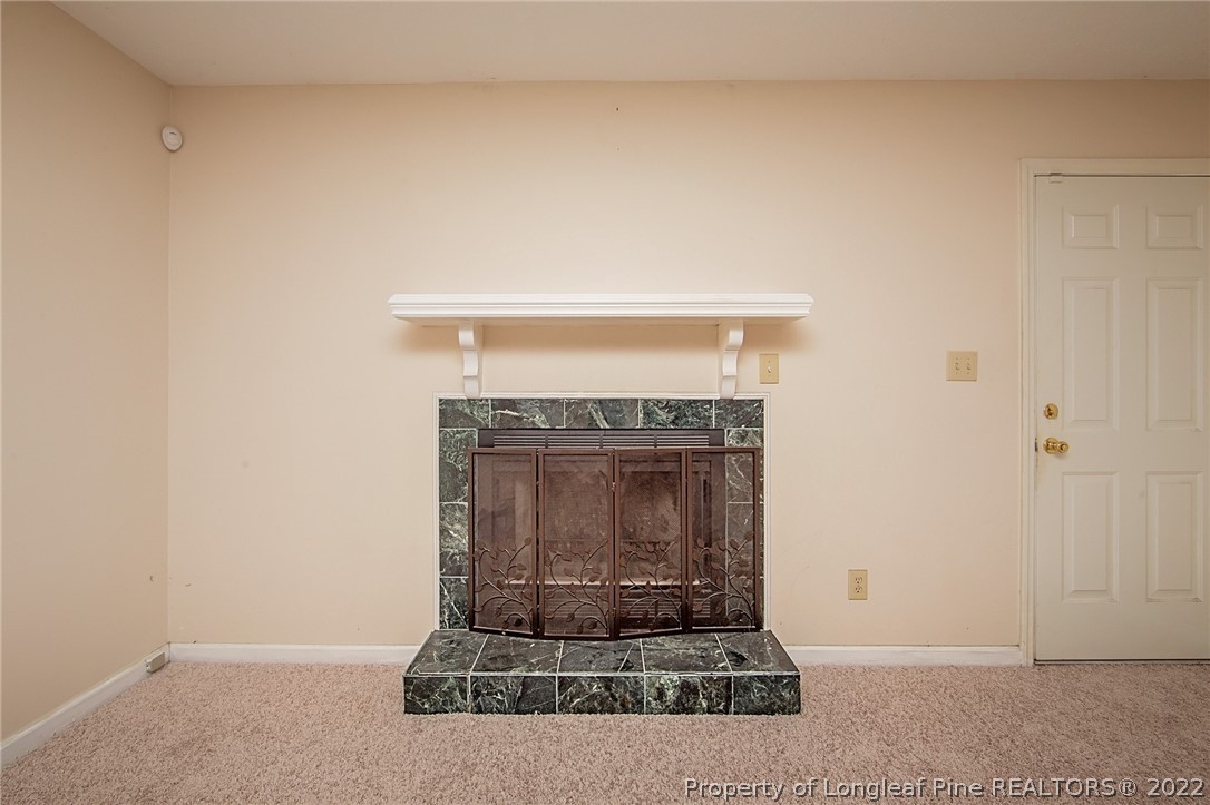 138 Pecan Trace Road Raeford, NC 28376 - Photo 23 of 42 a living room with a fireplace