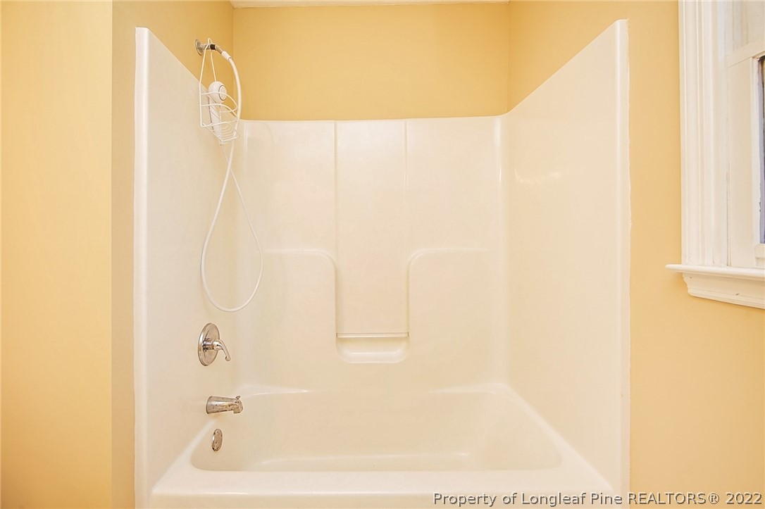 138 Pecan Trace Road Raeford, NC 28376 - Photo 36 of 42 a bathroom with a bathtub