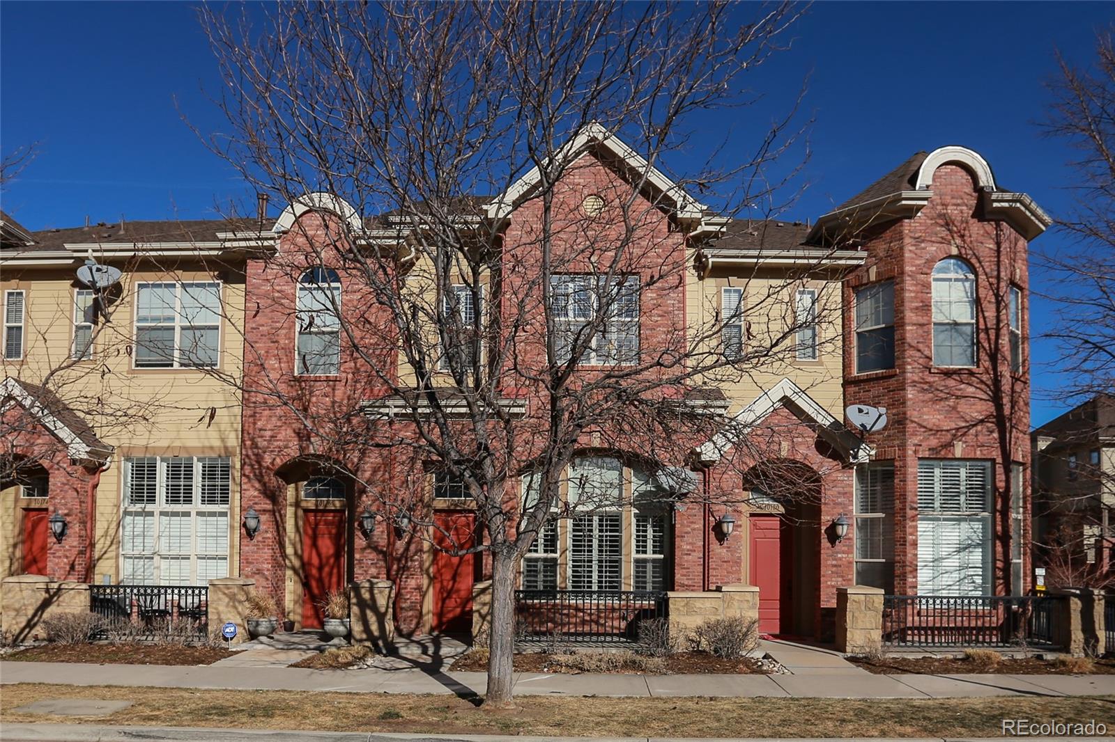 10178 RidgeGate Circle Lone Tree, CO 80124 - Photo 1 of 22 a view of a building with a street