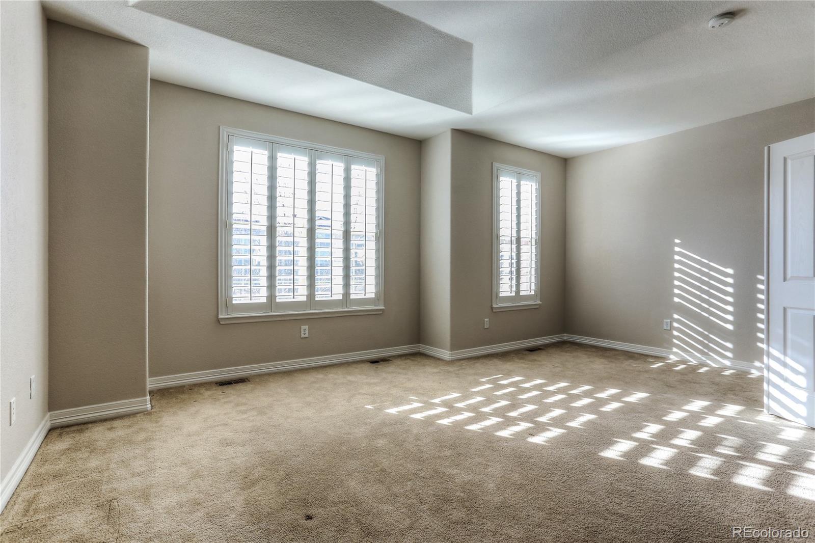 10178 RidgeGate Circle Lone Tree, CO 80124 - Photo 14 of 22 a view of empty room with window