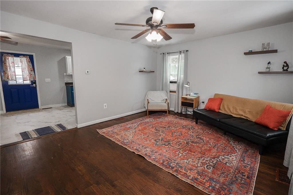 125 Church Road Slippery Rock, PA 16057 - Photo 14 of 35 a bedroom with furniture and a chandelier