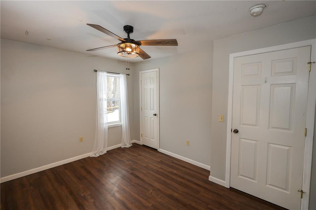 125 Church Road Slippery Rock, PA 16057 - Photo 20 of 35 wooden floor in an empty room with a window
