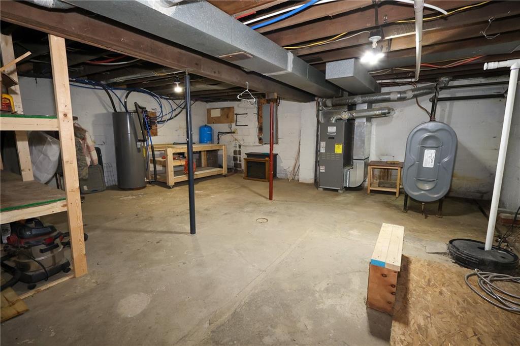 125 Church Road Slippery Rock, PA 16057 - Photo 24 of 38 Workshop area with laundry to the right of the photo