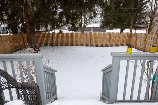 a view of outdoor space with deck and a garden