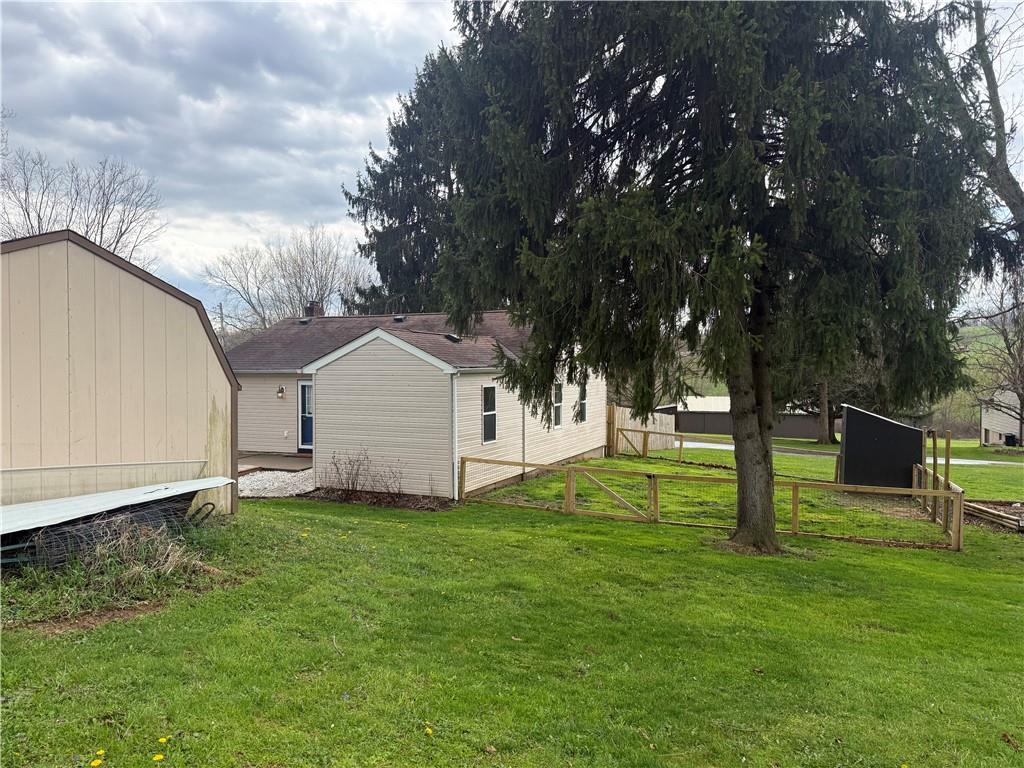 125 Church Road Slippery Rock, PA 16057 - Photo 31 of 35 a view of a house with backyard