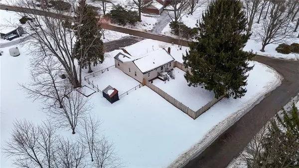 a view of a house with backyard
