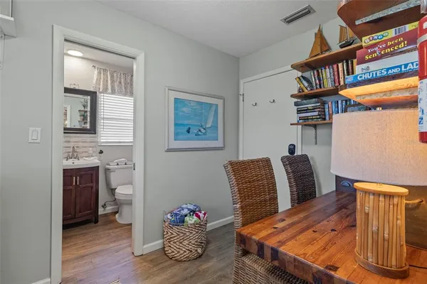 a view of livingroom with furniture and wooden floor
