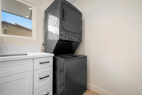 a kitchen with a stove and cabinets
