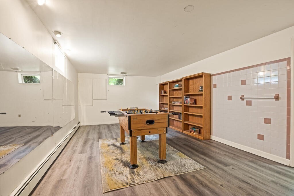 67 Sherburne Road South Lexington, MA 02421 - Photo 23 of 29 a workspace with furniture and wooden floor