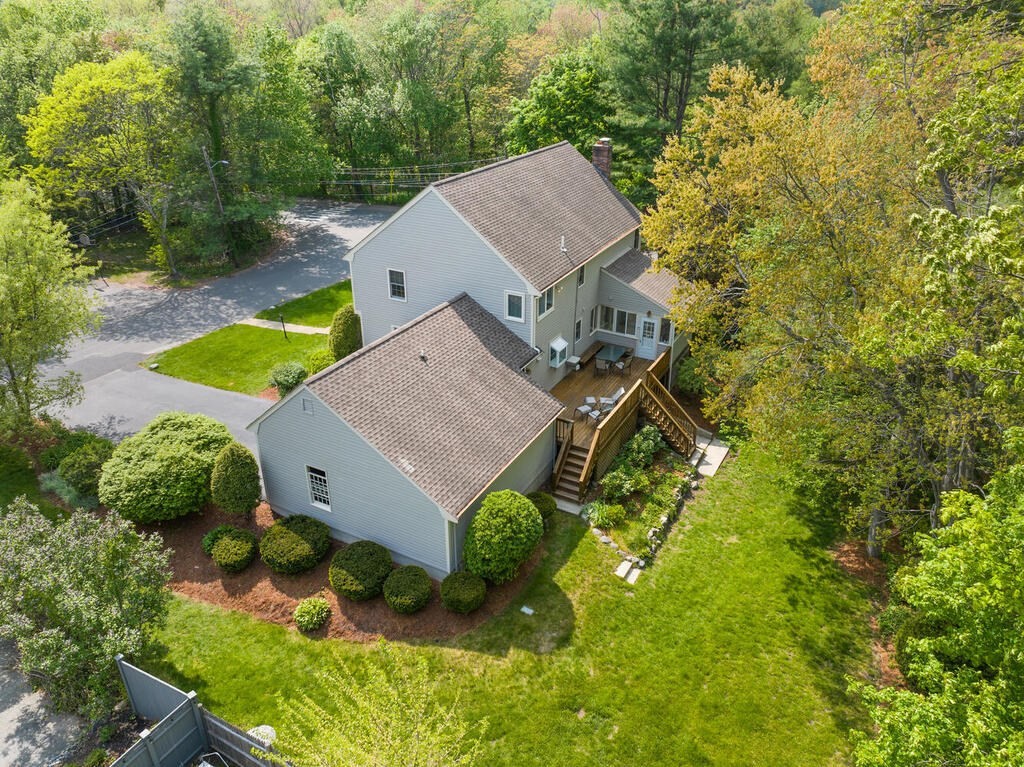 67 Sherburne Road South Lexington, MA 02421 - Photo 3 of 29 an aerial view of a house with swimming pool and garden