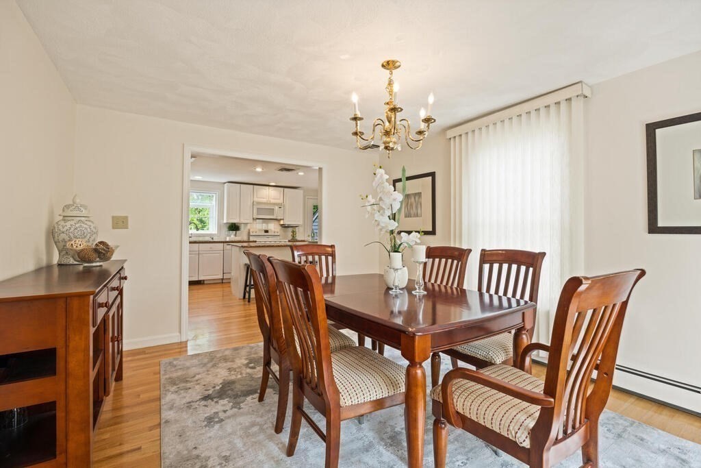 67 Sherburne Road South Lexington, MA 02421 - Photo 10 of 29 a view of a dining room with furniture