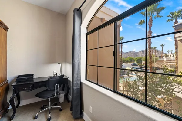 a view of a window with a desk