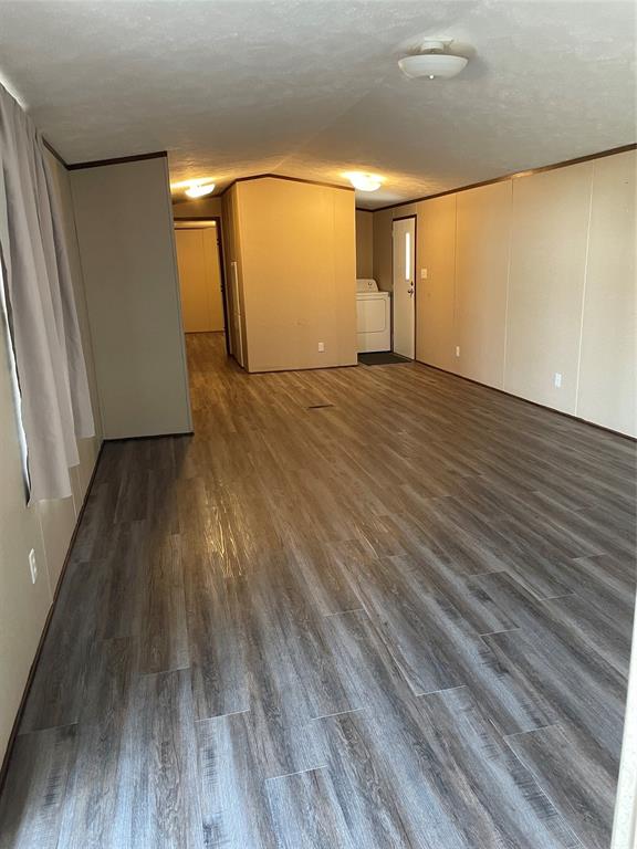 128 Blackjack Road Valley View, TX 76272 - Photo 12 of 13 a view of empty room with wooden floor and fan