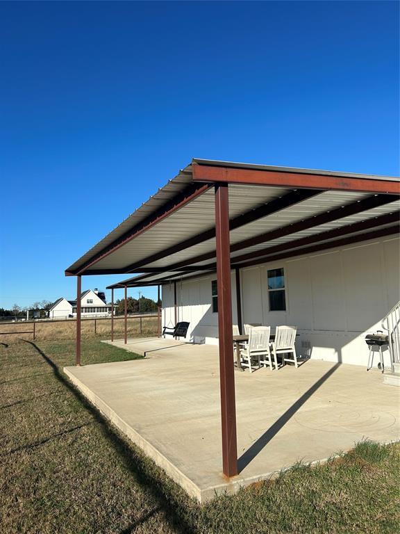 128 Blackjack Road Valley View, TX 76272 - Photo 6 of 13 a view of a swimming pool with an outdoor seating