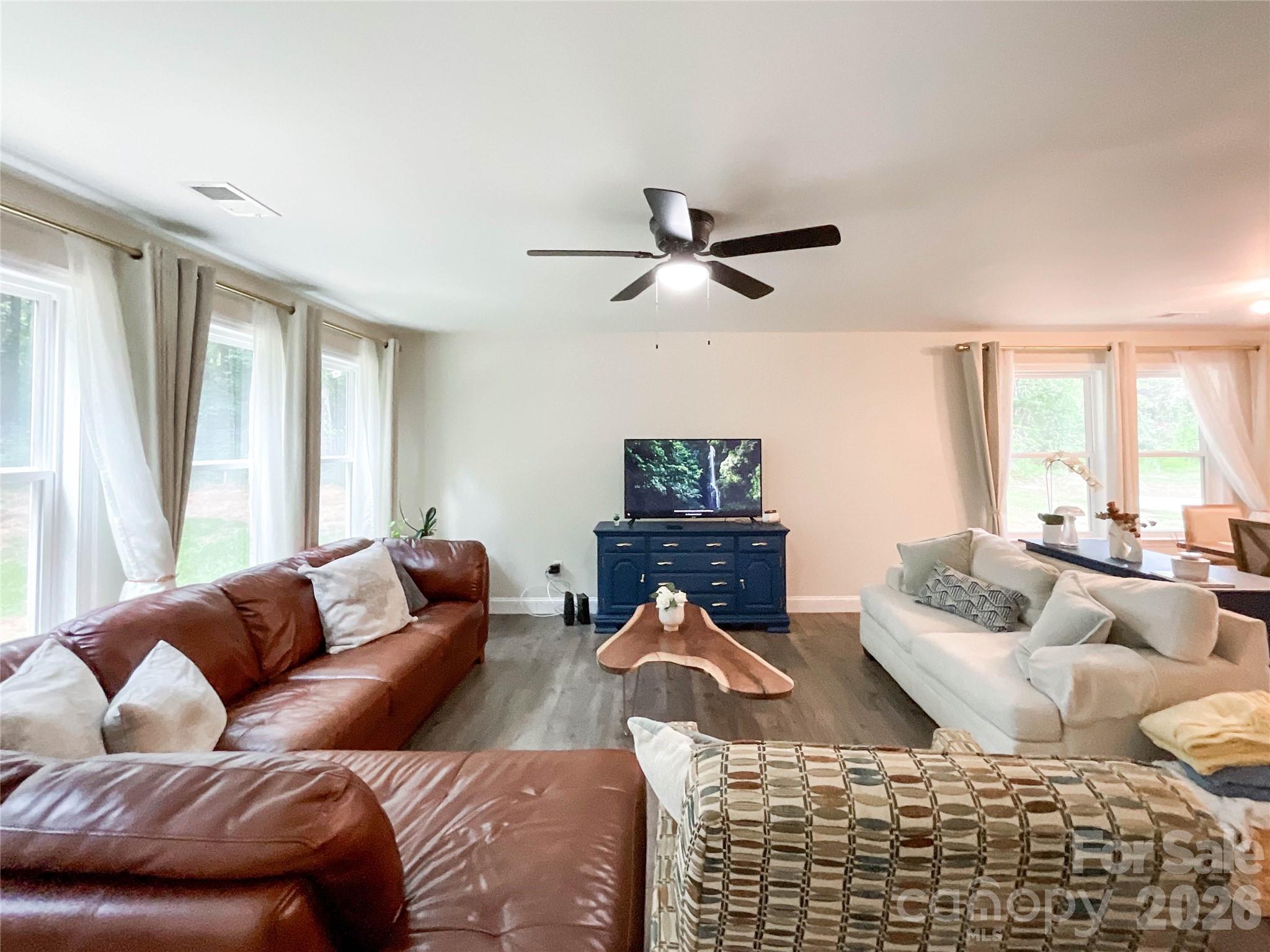 404 White Store Road Wadesboro, NC 28170 - Photo 17 of 38 a living room with furniture or couch and a window