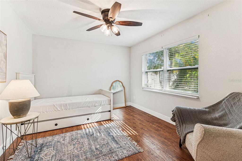 727 Locust Street Tarpon Springs, FL 34689 - Photo 16 of 47 a living room with furniture and a window