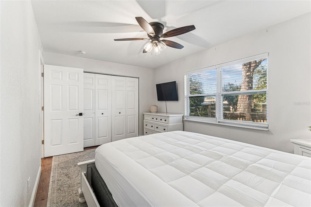 727 Locust Street Tarpon Springs, FL 34689 - Photo 23 of 47 a bedroom with a large bed and a window