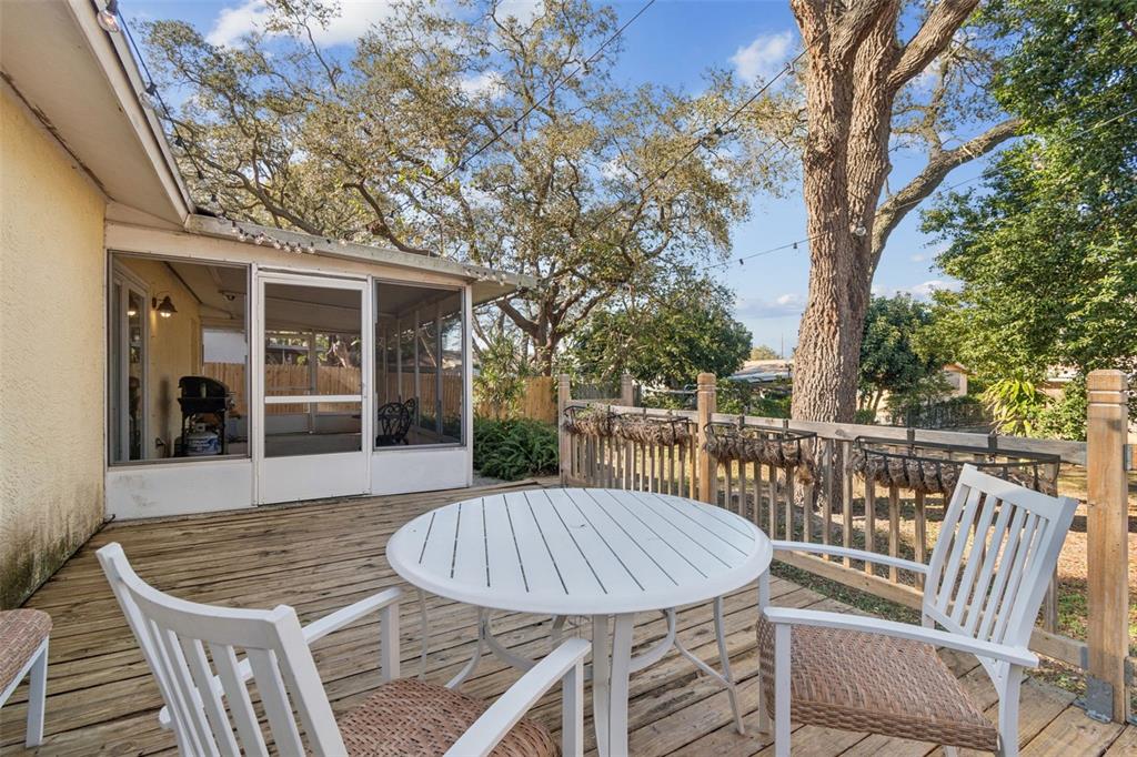 727 Locust Street Tarpon Springs, FL 34689 - Photo 28 of 47 a view of a chair and table in the balcony