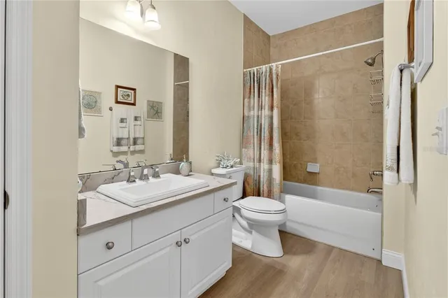 a view of kitchen with wooden floor