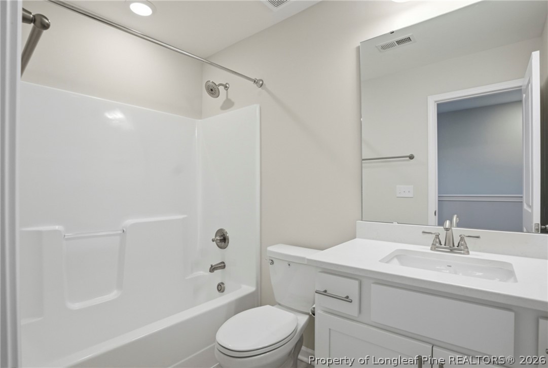 106 Knotts Berry Road Bunnlevel, NC 28323 - Photo 41 of 50 a bathroom with a sink toilet and shower