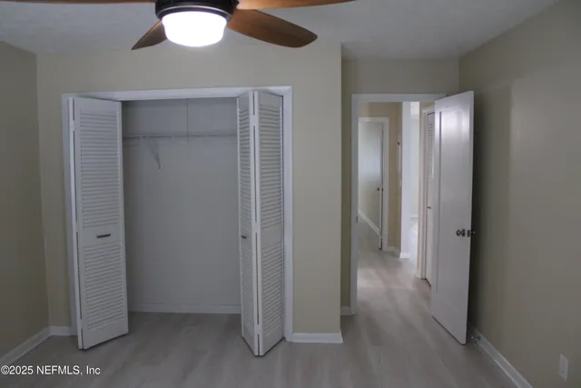 a view of a livingroom with wooden floor
