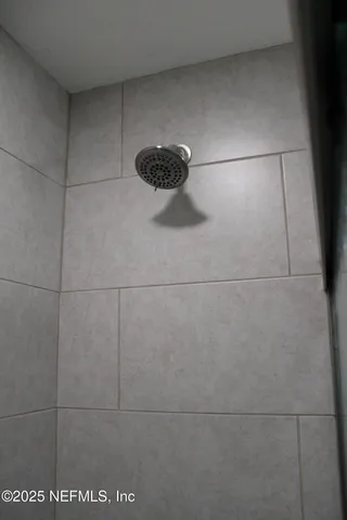 a close view of a shower in a bathroom