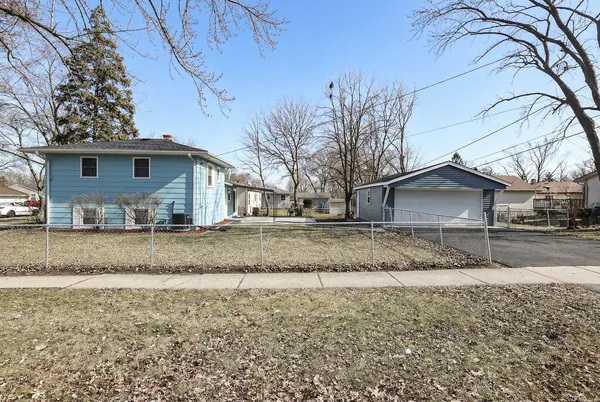 a view of a backyard of a house