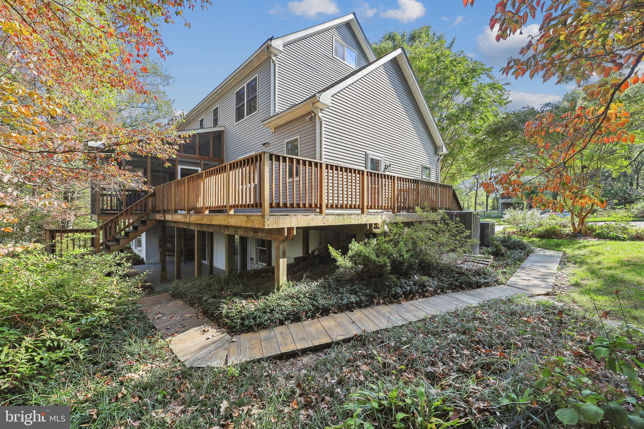 11906 Progress Lane Bowie, MD 20721 - Photo 77 of 107 Side View Of House With Wood Walkway
