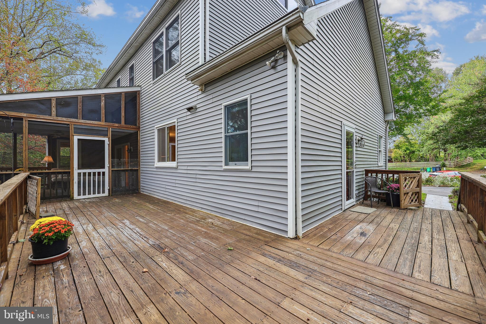 11906 Progress Lane Bowie, MD 20721 - Photo 81 of 107 Large Wooden Deck That Leads To Screened Porch