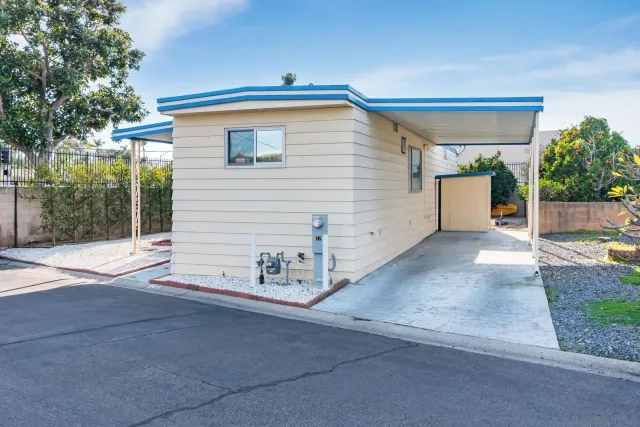 a view of a house with a street